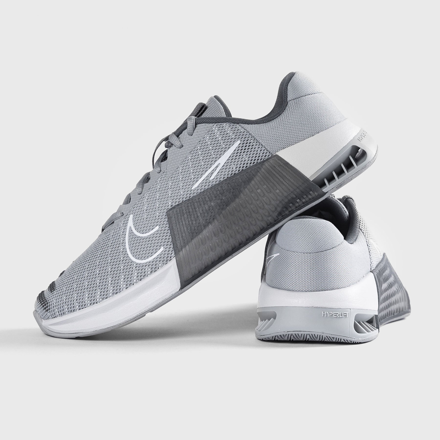 Light best sale gray nikes