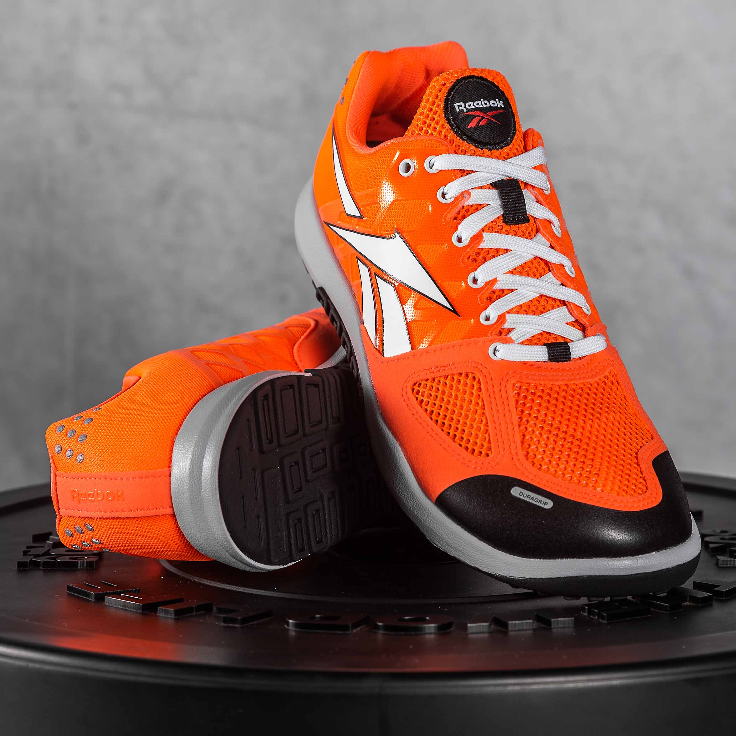 Orange reebok shop crossfit shoes